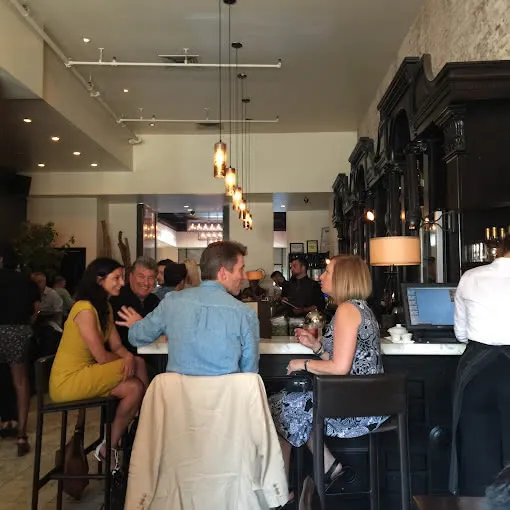 cover image of event - people dining in a corporate setting